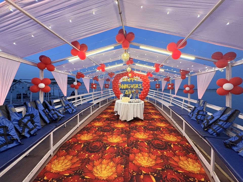 Anniversary event on boat in Varanasi with evening canopy and lights – Varanasi Boat Events