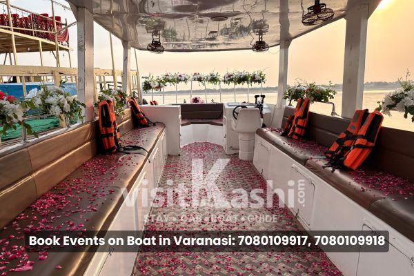 Marriage proposal event on boat in Varanasi with floral decoration – Varanasi Boat Events