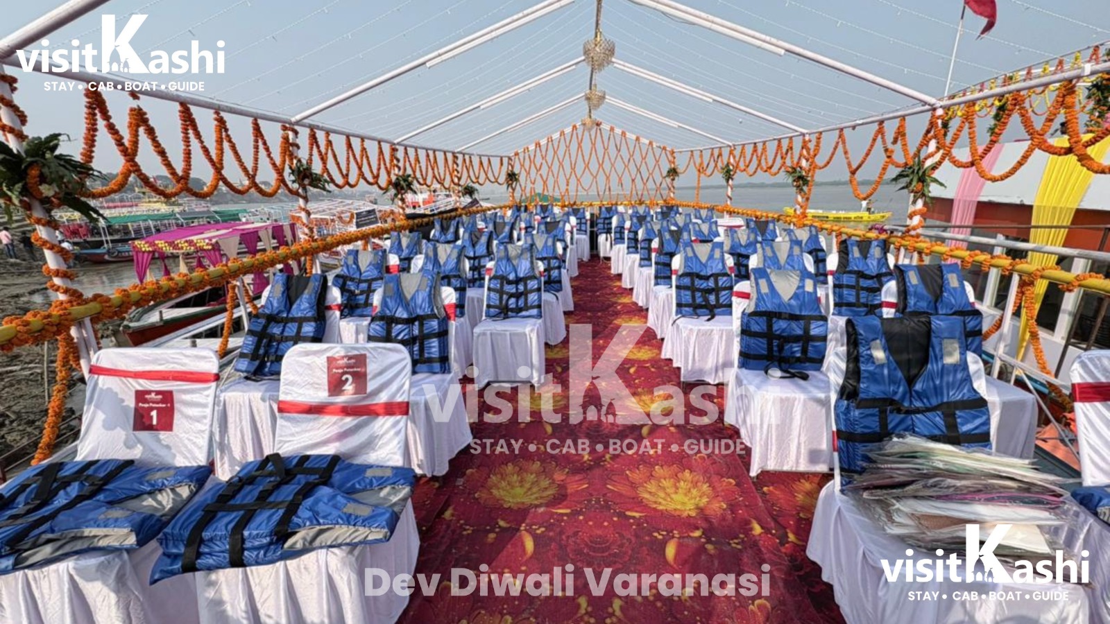 White chairs with blue life jackets on the decorated Bajra boat deck